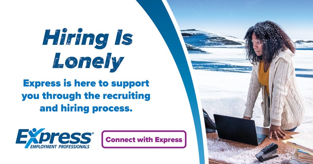 An advertising image with text stating "Hiring is Lonely" next to a photo of a woman working on a laptop in a snowy outdoor setting, suggesting the challenges of recruiting staff. 

Text says Hiring is Lonely Express is here to support you through the recruiting and hiring process. Express Employment Professionals, Connect with Express.  