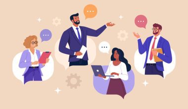 Four business professionals engaged in a collaborative discussion, with speech bubbles and gear icons symbolizing teamwork and communication.