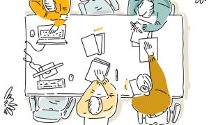 Illustration: top-down view of four adults (men and women) seated around a table collaborating, wearing casual tops in yellow, teal, and neutral tones, writing on papers with pens and laptops nearby.